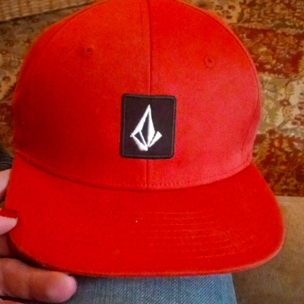 Red volcom hat